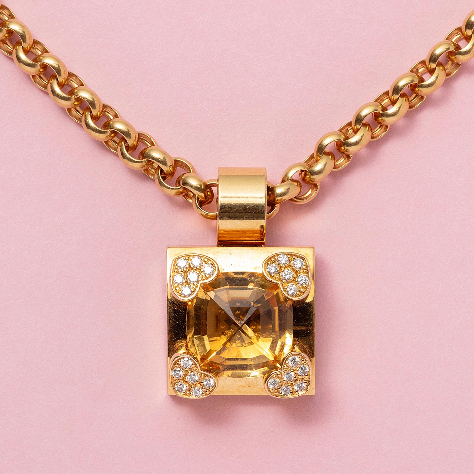 A 18 carat yellow gold square pendant set with a big cushion cut citrine held by four hearts in the corners each pavé set with diamonds. With a 18 carat yellow gold necklace. Both signed: Chopard, 2746331, 79/3832/20, French.

weight pendant: 11.12