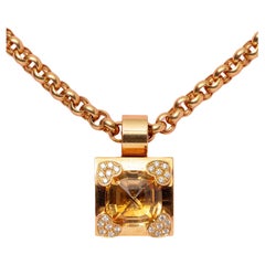 An 18 Carat Gold Citrine and Diamond Chopard Pendant and Chain