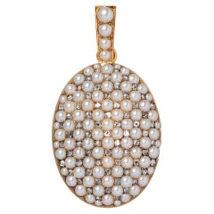 An 18 Carat Gold French Locket with Pearls and Rose Cut Diamonds