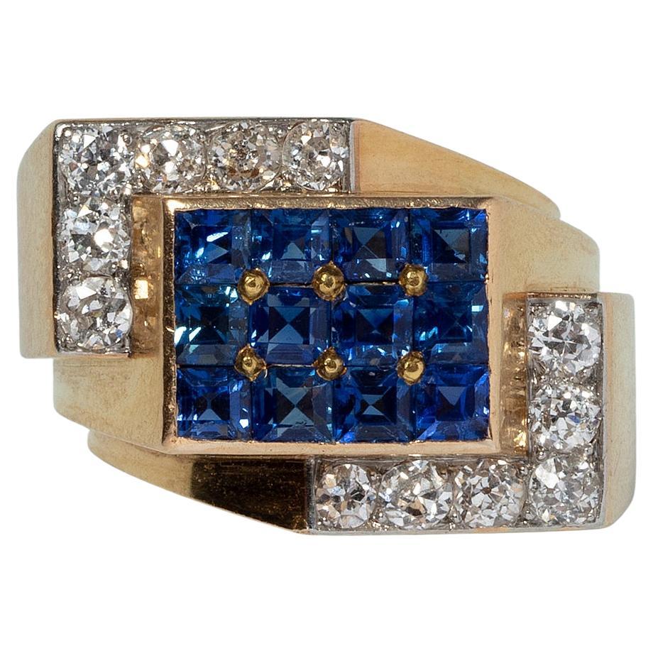 An 18 Carat Gold French Retro Ring with Sapphire and Diamond