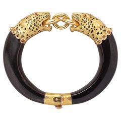 An 18 Carat Gold Gay Frères Panther Bracelet with Wood