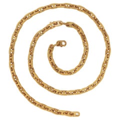 An 18 Carat Gold Hermès Paris Chain and Bracelet