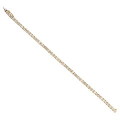 An 18 Carat Gold Line Bracelet with Diamond