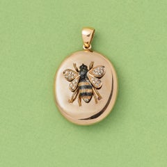 an 18 Carat Gold Locket with a Bee