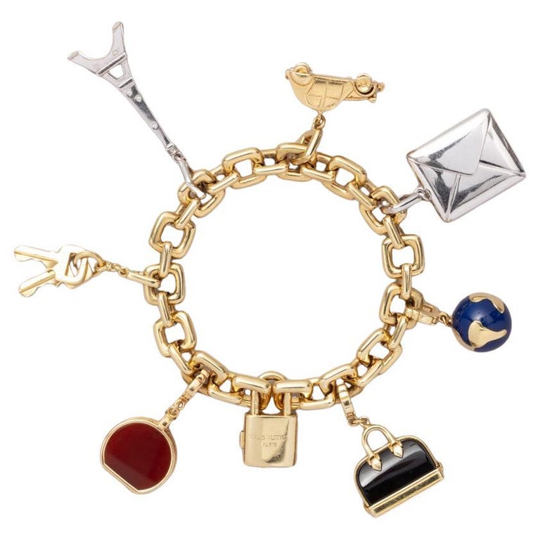An 18 Carat Gold Louis Vuitton Charm Bracelet For Sale at 1stDibs