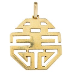 An 18 carat gold Lucky Bulgari pendant