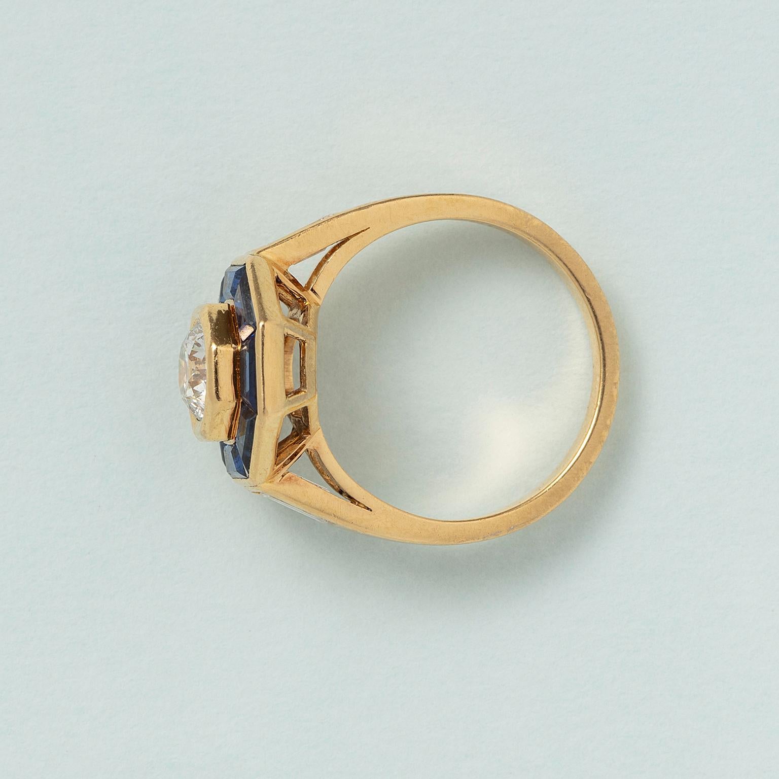 An 18 Carat Gold Mellerio Gold Ring with Diamond and Sapphire For Sale 1