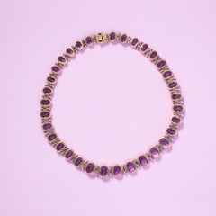 Eine Halskette aus 18 Karat Gold mit Amethyst, Peridot und Diamant