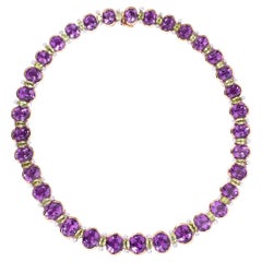 An 18 Carat Gold Necklace with Amethyst, Peridot and Diamond