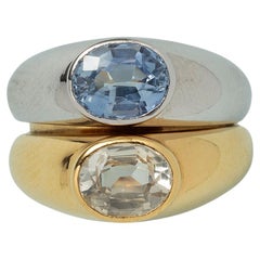 Ein Poiry-Ring aus 18 Karat Gold mit Saphir