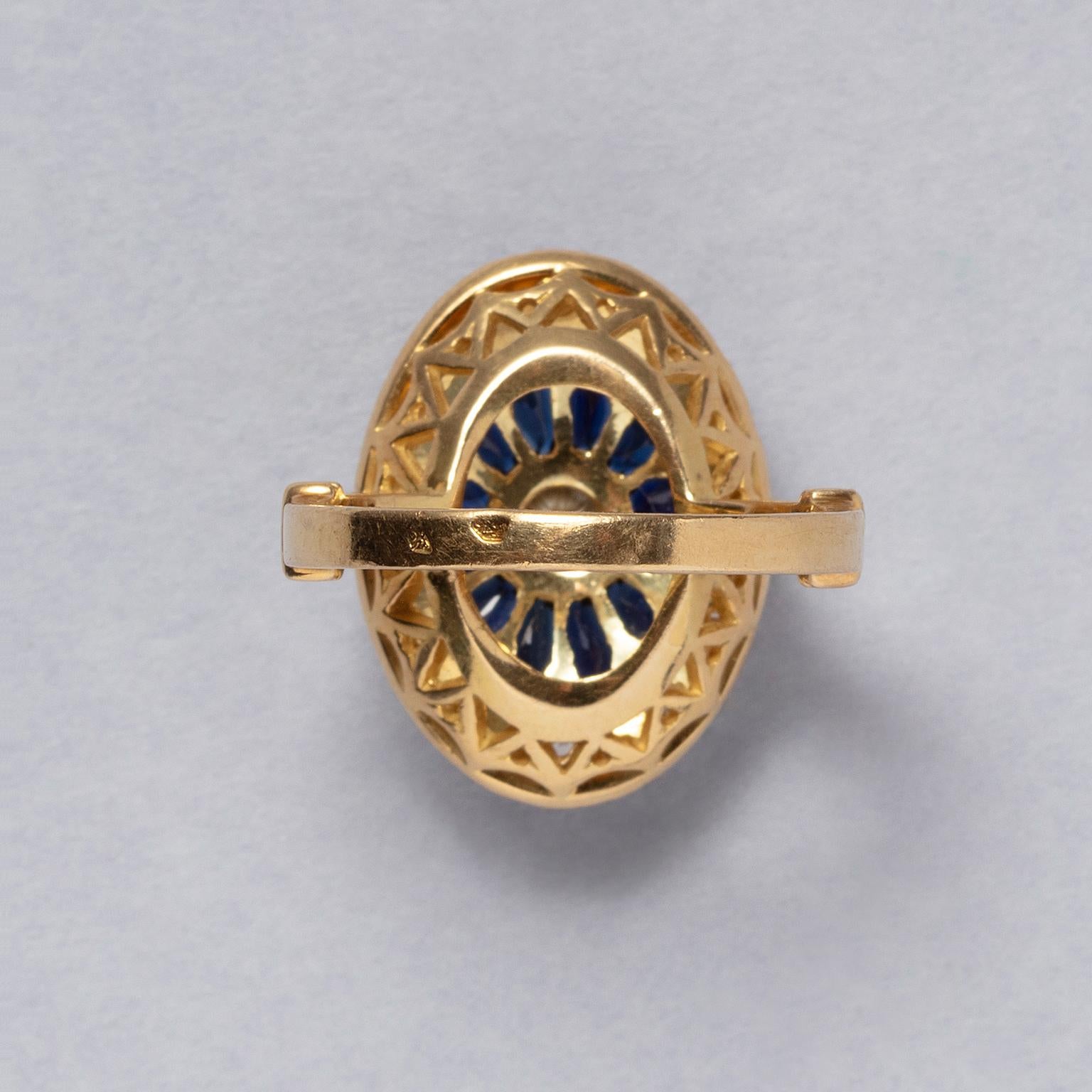 An 18 carat gold ring with diamond and sapphire In Excellent Condition For Sale In Amsterdam, NL