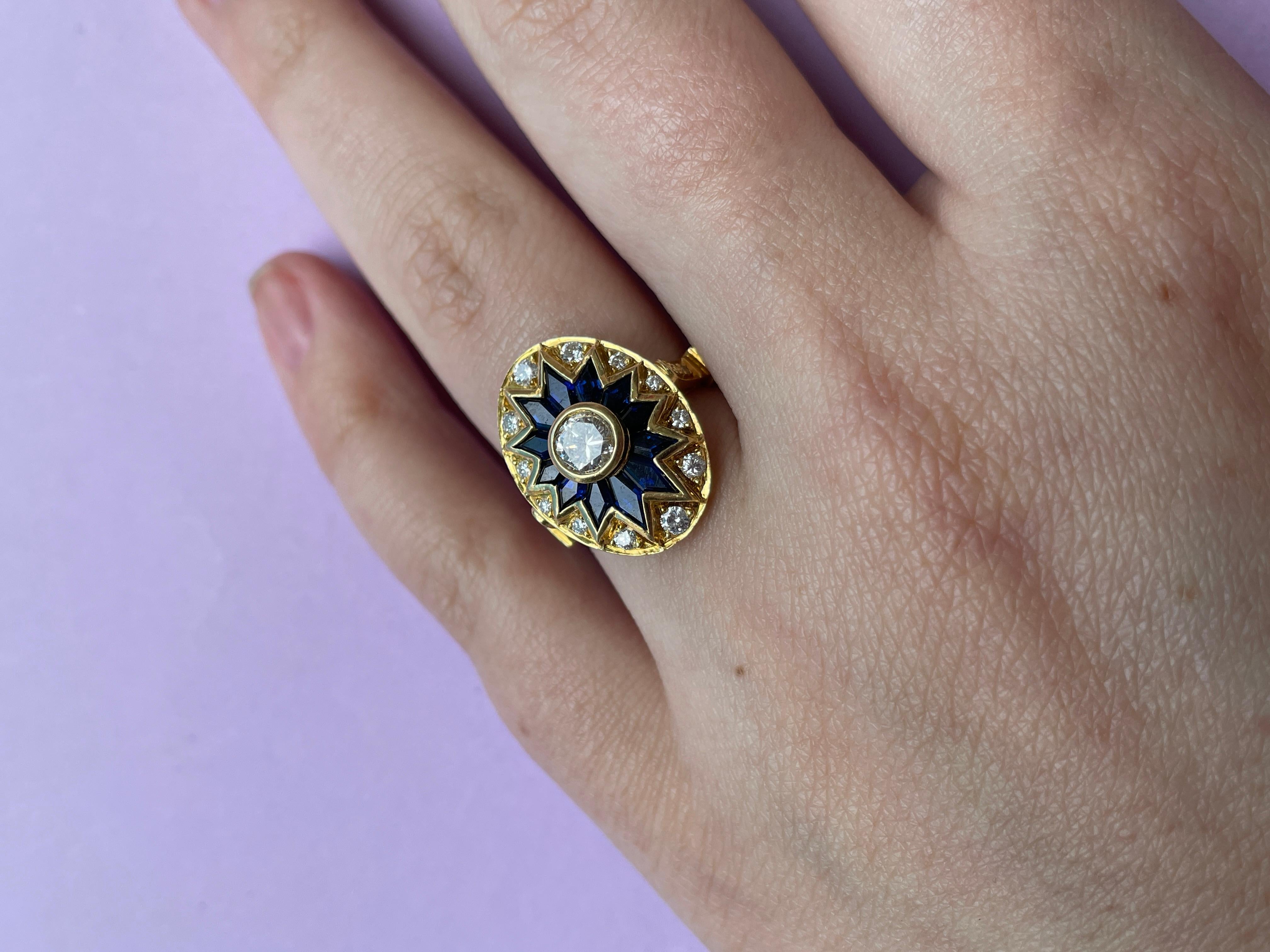 An 18 carat gold ring with diamond and sapphire For Sale 1