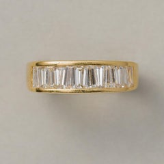 18 Carat Gold Ring with Tapered Baguette Cut Diamonds
