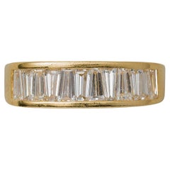 18 Carat Gold Ring with Tapered Baguette Cut Diamonds