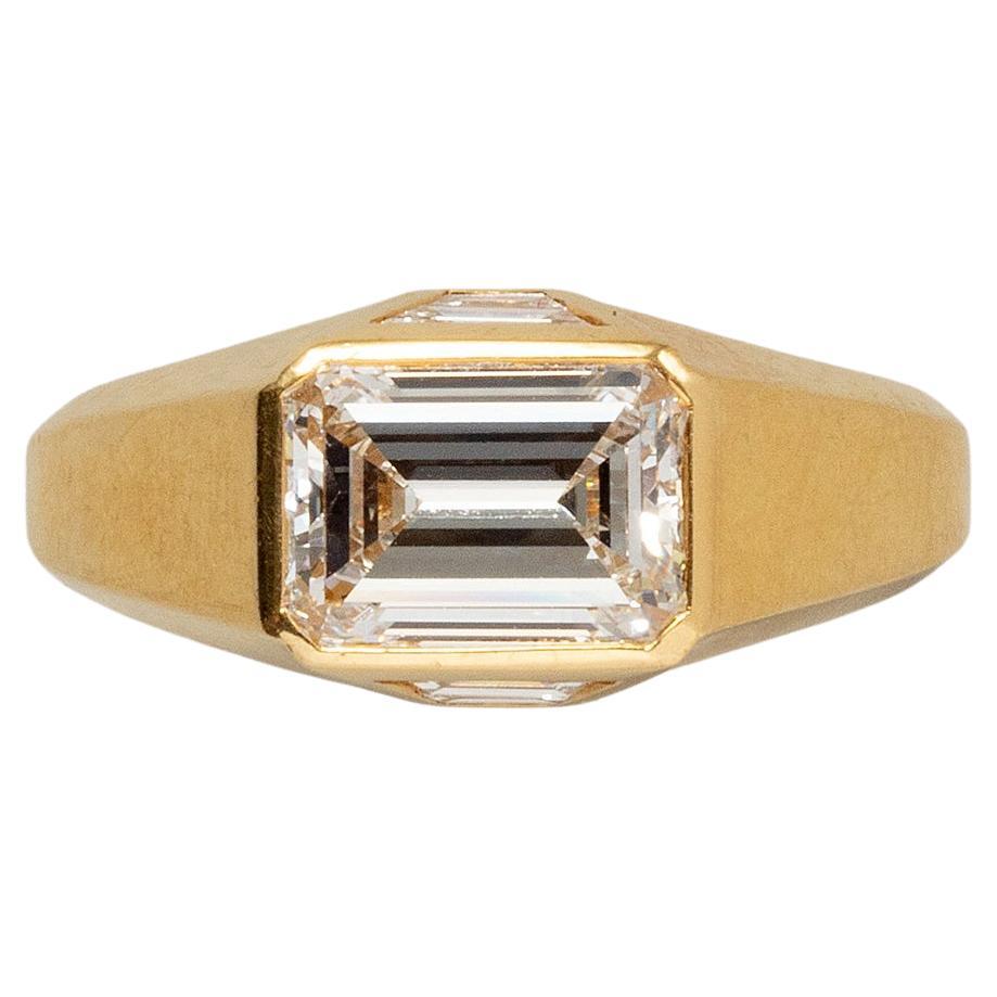 An 18 Carat Gold Step Cut Diamond Bulgari Ring For Sale