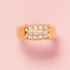 An 18 carat gold Tronchetto Bulgari ring with diamonds