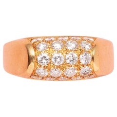 An 18 carat gold Tronchetto Bulgari ring with diamonds