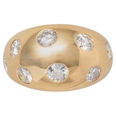 An 18 Carat Gold Van Cleef & Arpels Bombé Ring with Diamonds