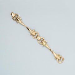 Un braccialetto in oro 18 carati con un morsetto da cavallo o da Weingrill