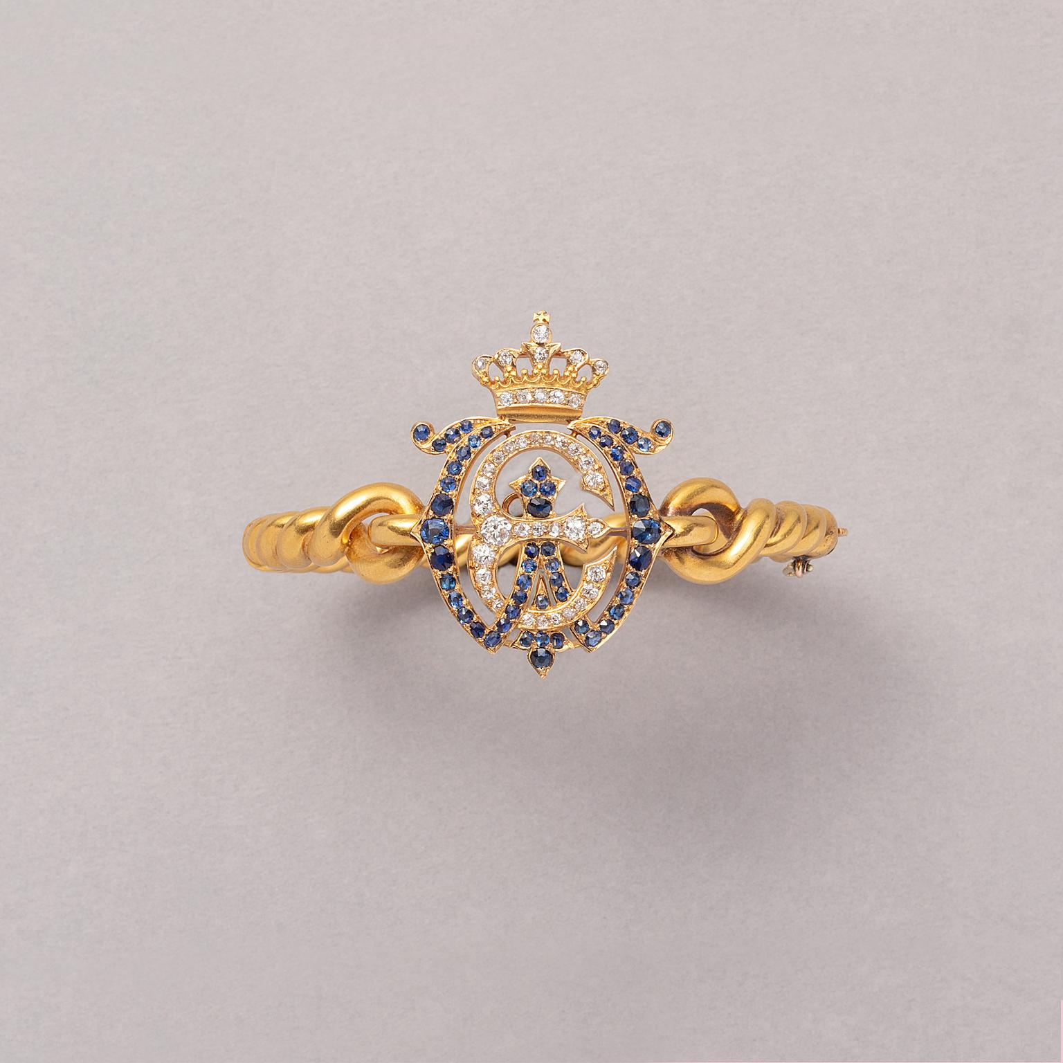 Victorien Un bracelet royal de 18 carats avec les initiales WE en diamant et saphir en vente