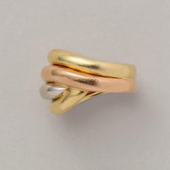 An 18 Carat Tri-Color Knot Fred Ring