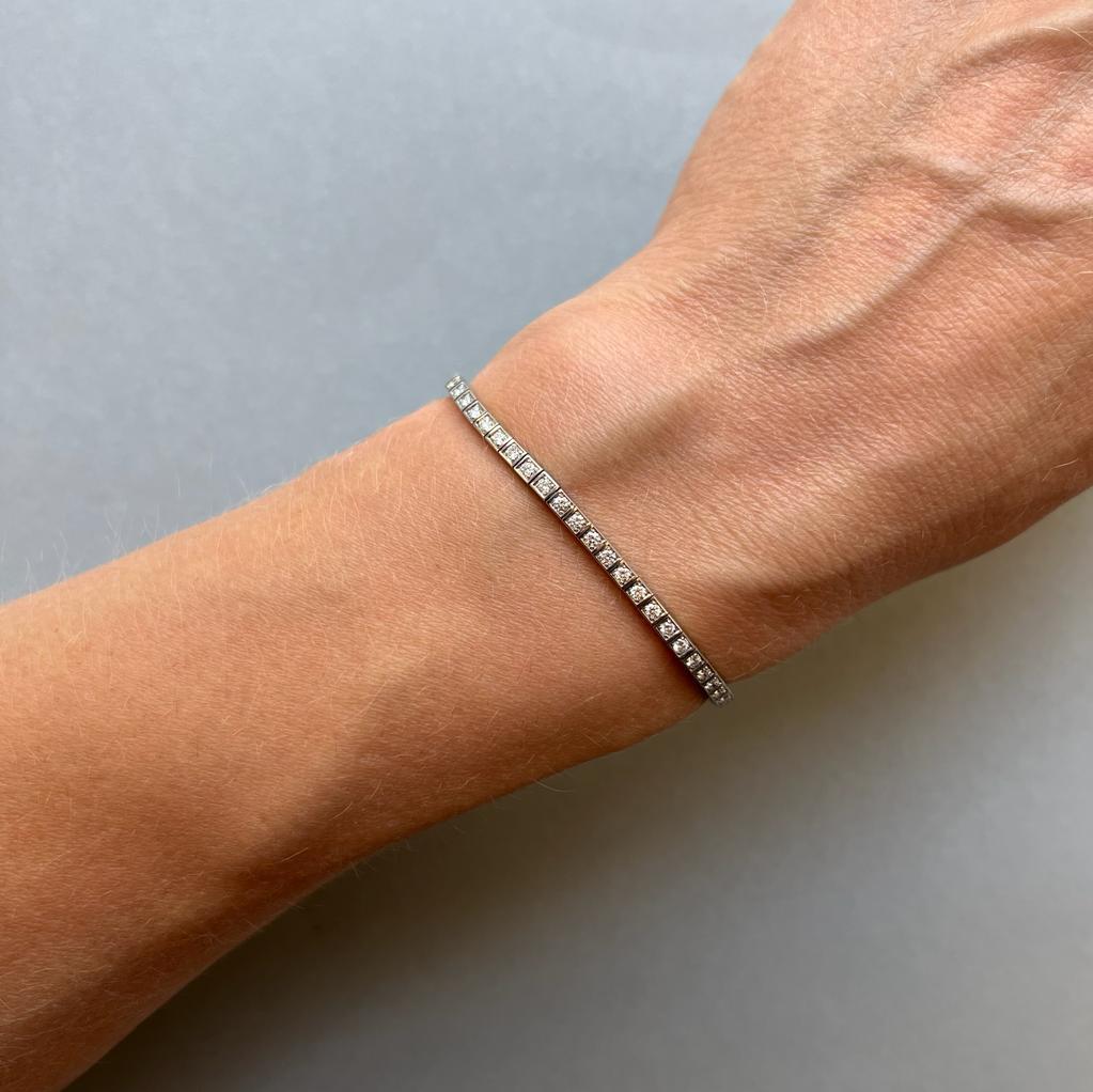 An 18 Carat White Gold and Diamond Cartier Bracelet 1