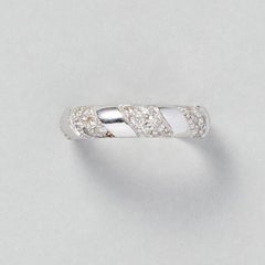An 18 Carat White Gold Band Ring with Diamonds