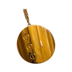An 18 carat yellow gold Cartier love disc pendant