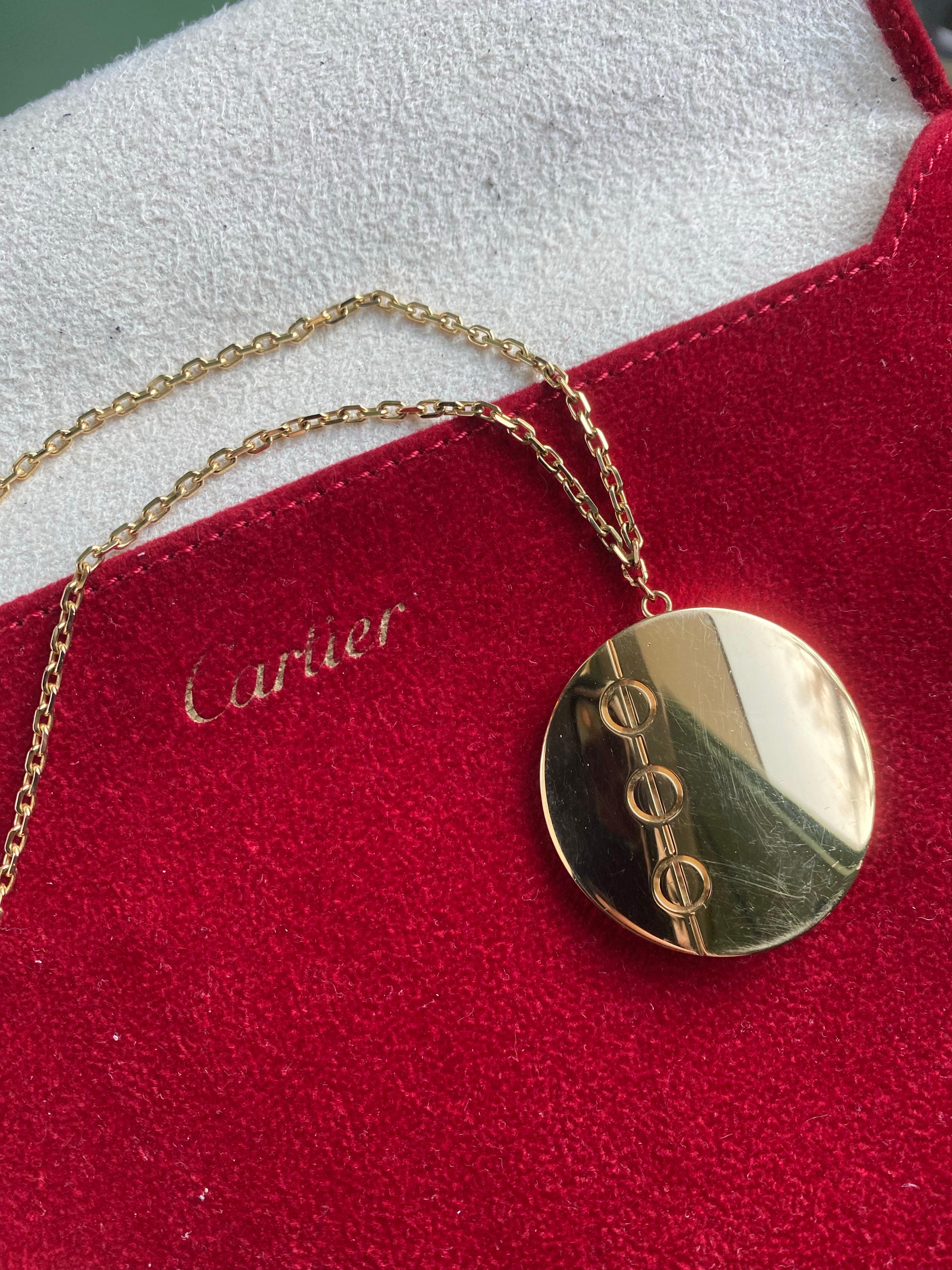 An 18 carat yellow gold Cartier love disc pendant In Good Condition For Sale In Amsterdam, NL