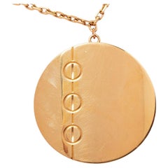 Pendentif disque d'amour en or jaune 18 carats de Cartier