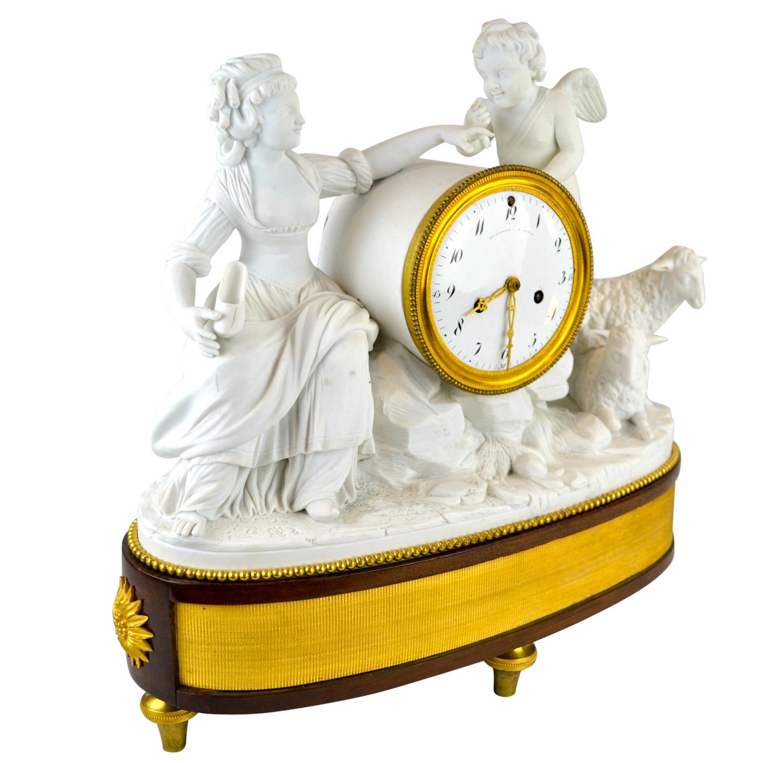 A late 18th century French Louis XVI bisque shepherdess mantel clock. The tableau modelled in bisque porcelain (unglazed porcelain), showing a shepherdess on the left holding her shoe to a winged putto, along with grazing sheep. The figural group