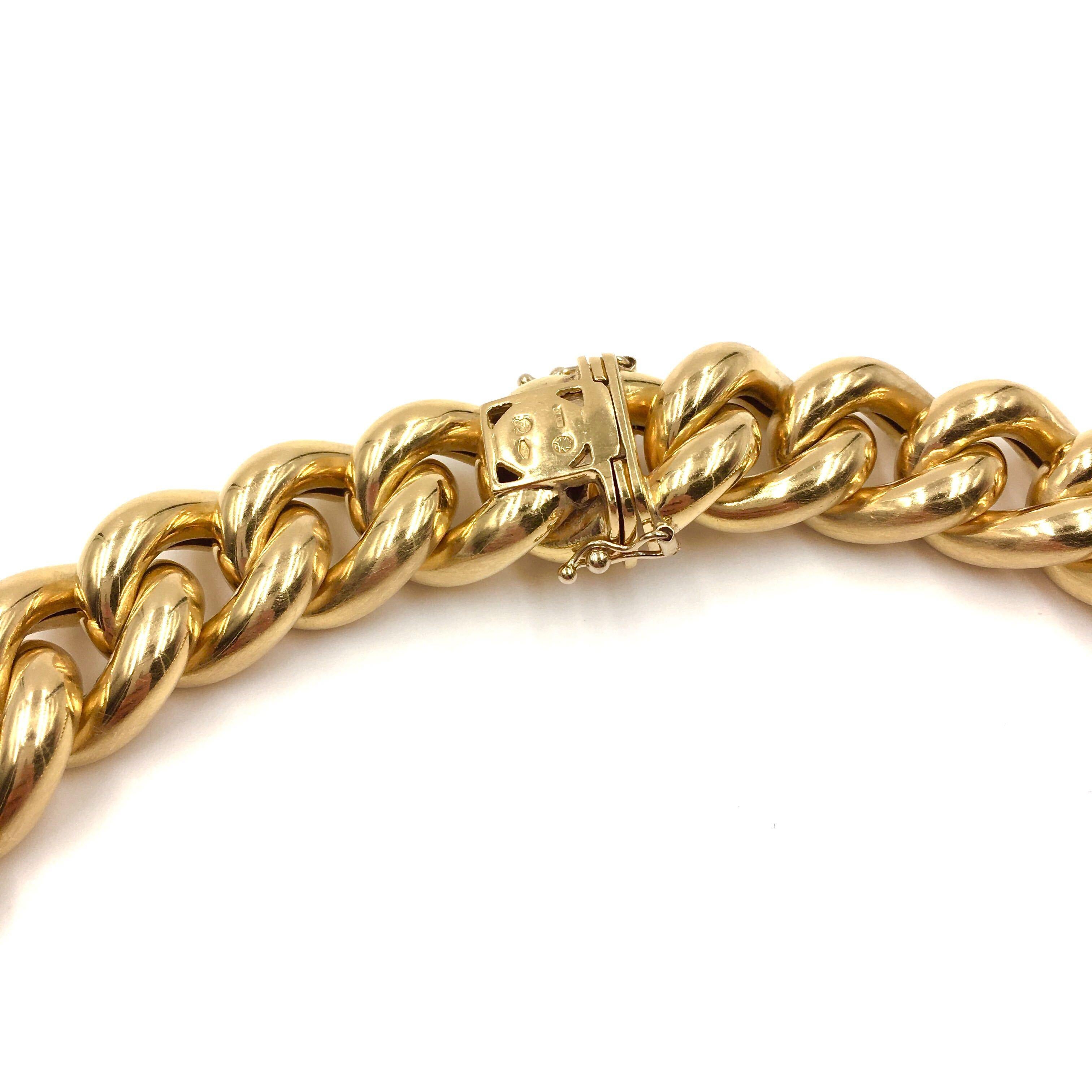 An 18 karat yellow gold necklace. Italian. Designed as matte curb links, the reverse polished. Length is approximately 18 1/2 inches, gross weight is approximately 147.1 grams. 