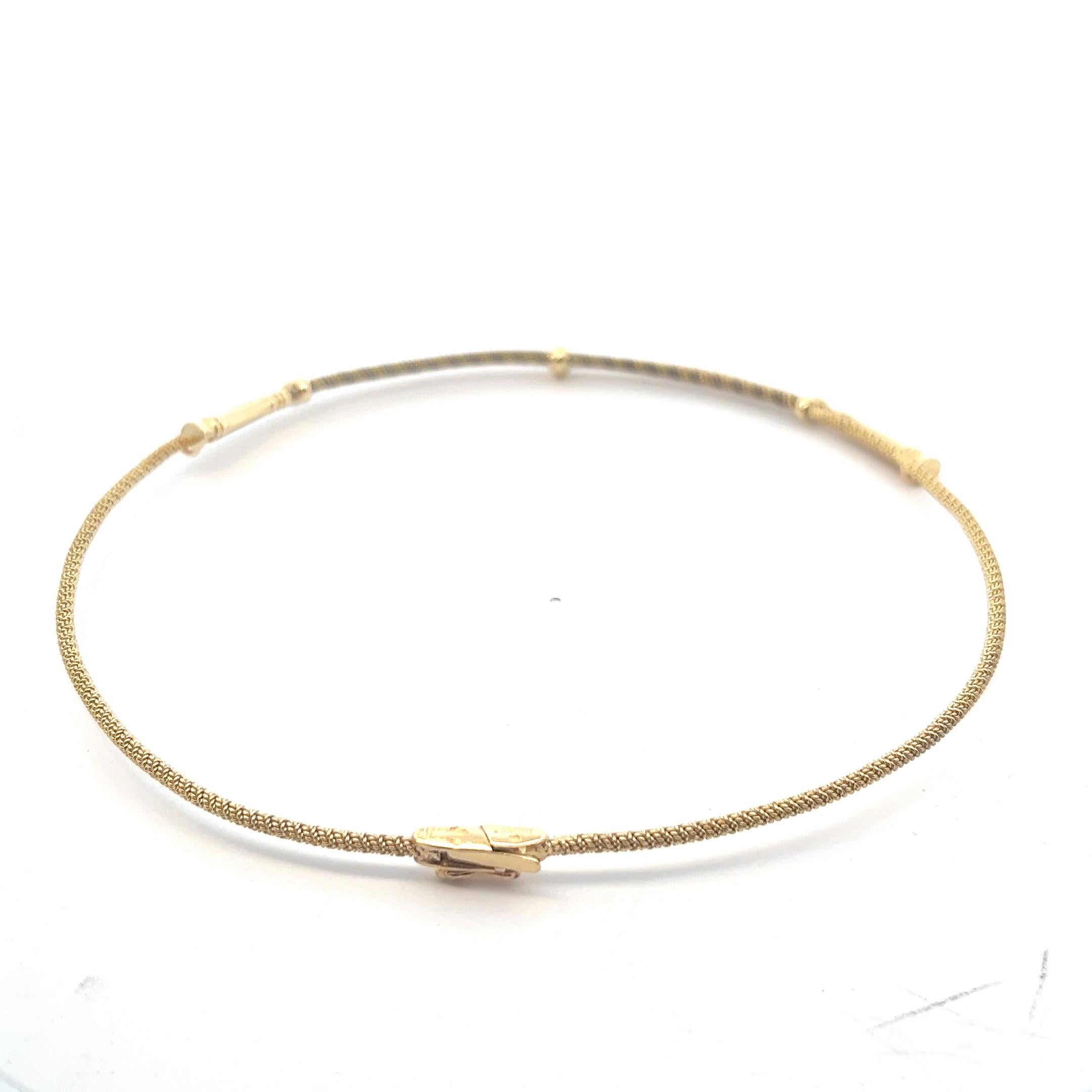 An 18 karat yellow gold necklace by Hermès. 1