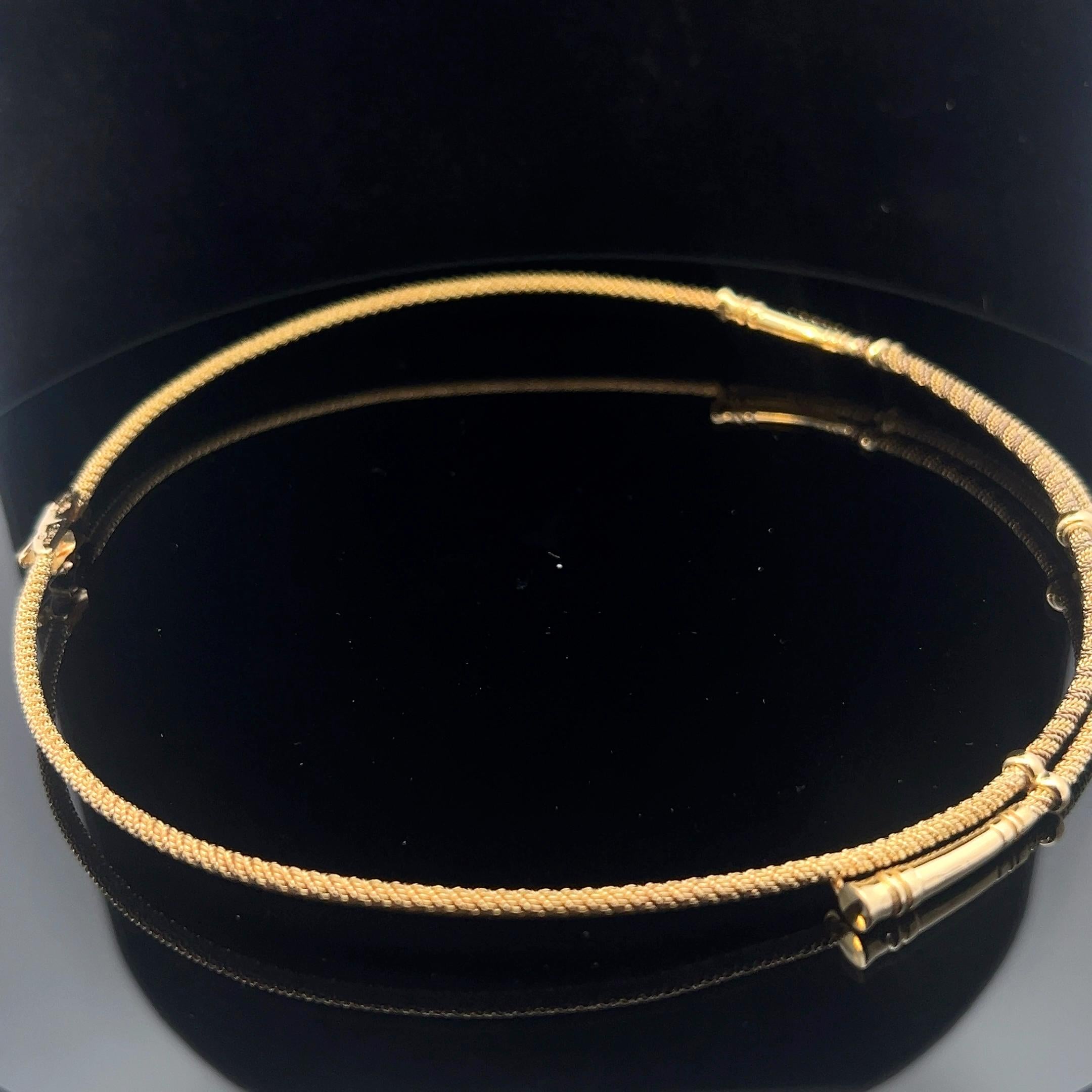 An 18 karat yellow gold necklace by Hermès. 3