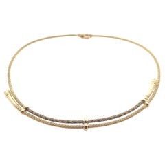 An 18 karat yellow gold necklace by Hermès.