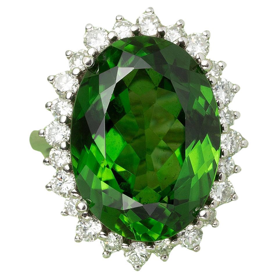 An 18 White Carat Gold Cluster Ring set with a Green Tourmaline and Diamonds  For Sale