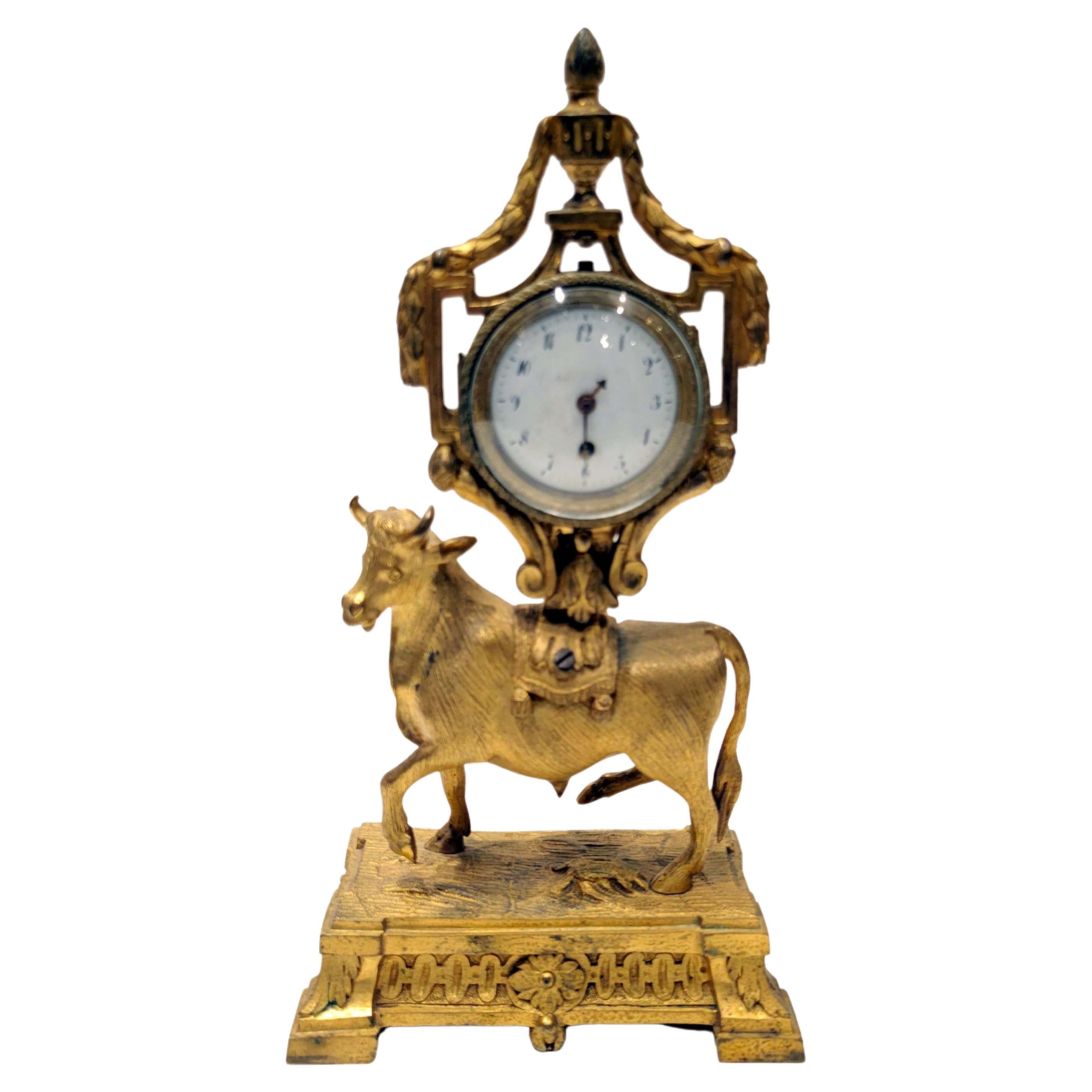 18thC. Gilt Bronze Mantel Clock with a Bull For Sale