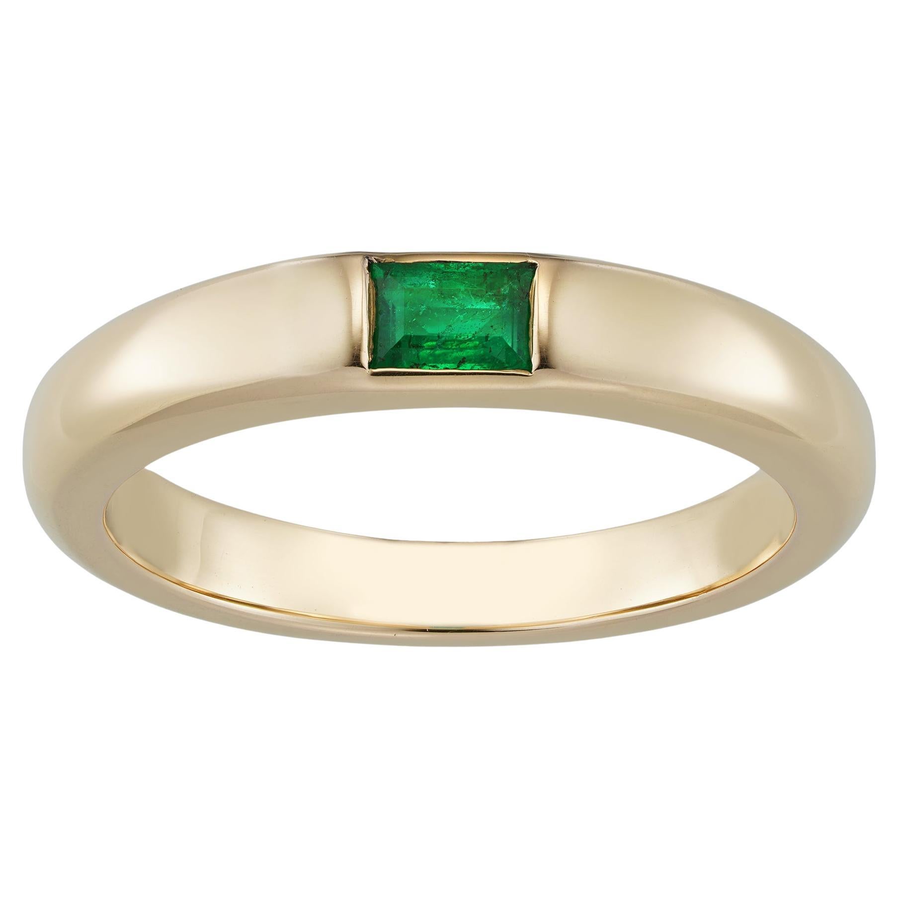 An 18ct Rose Gold Token Ring Set With A Baguette Emerald For Sale