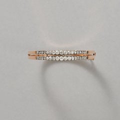 An 18K French Victorian Bangle with Diamonds set in Silver