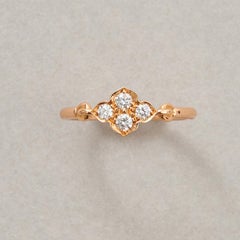 An 18k Gold and Diamond Carrtier Hindu Ring