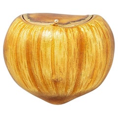An 18k Gold and Enamel Gucci Hazelnut Pill Box