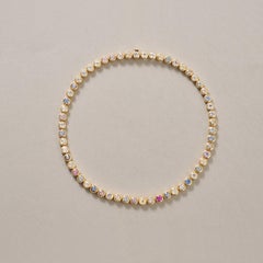 An 18k Gold and multi-colored sapphire necklace by Bücherer