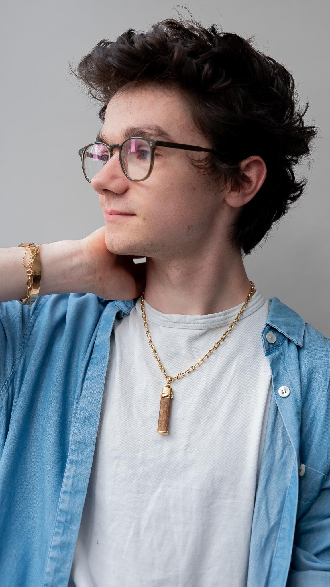 Women's or Men's An 18k Gold and Wood Cartier Good Luck Pendant For Sale