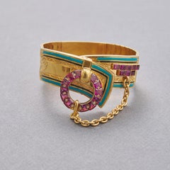 An 18k Gold Bangle with Garnets and Enamel