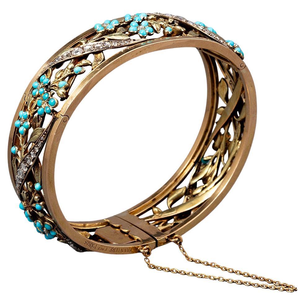 An 18k gold bracelet with turquoise and diamond For Sale