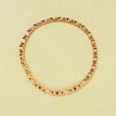 An 18k Gold Bulgari Parentesi Necklace with Sapphire and Diamond