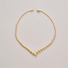 An 18k gold Cartier Ball necklace