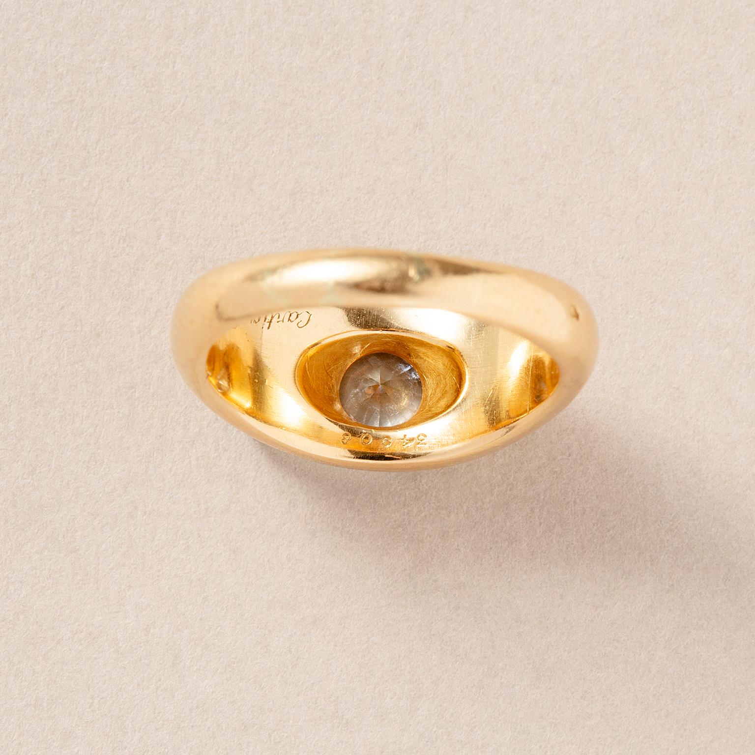 An 18k Gold Cartier Ring with a Flush set Solitair Diamond For Sale 5