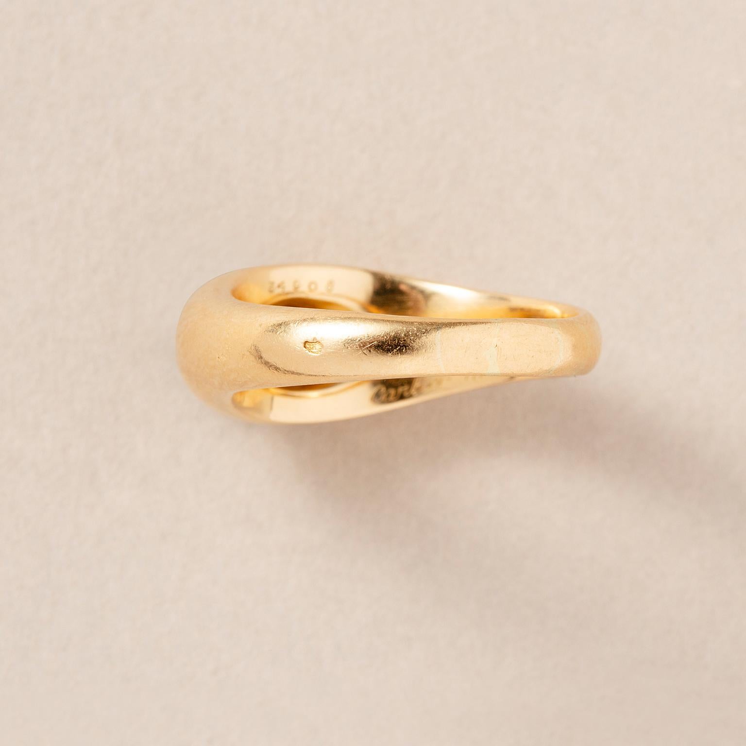 An 18k Gold Cartier Ring with a Flush set Solitair Diamond For Sale 7