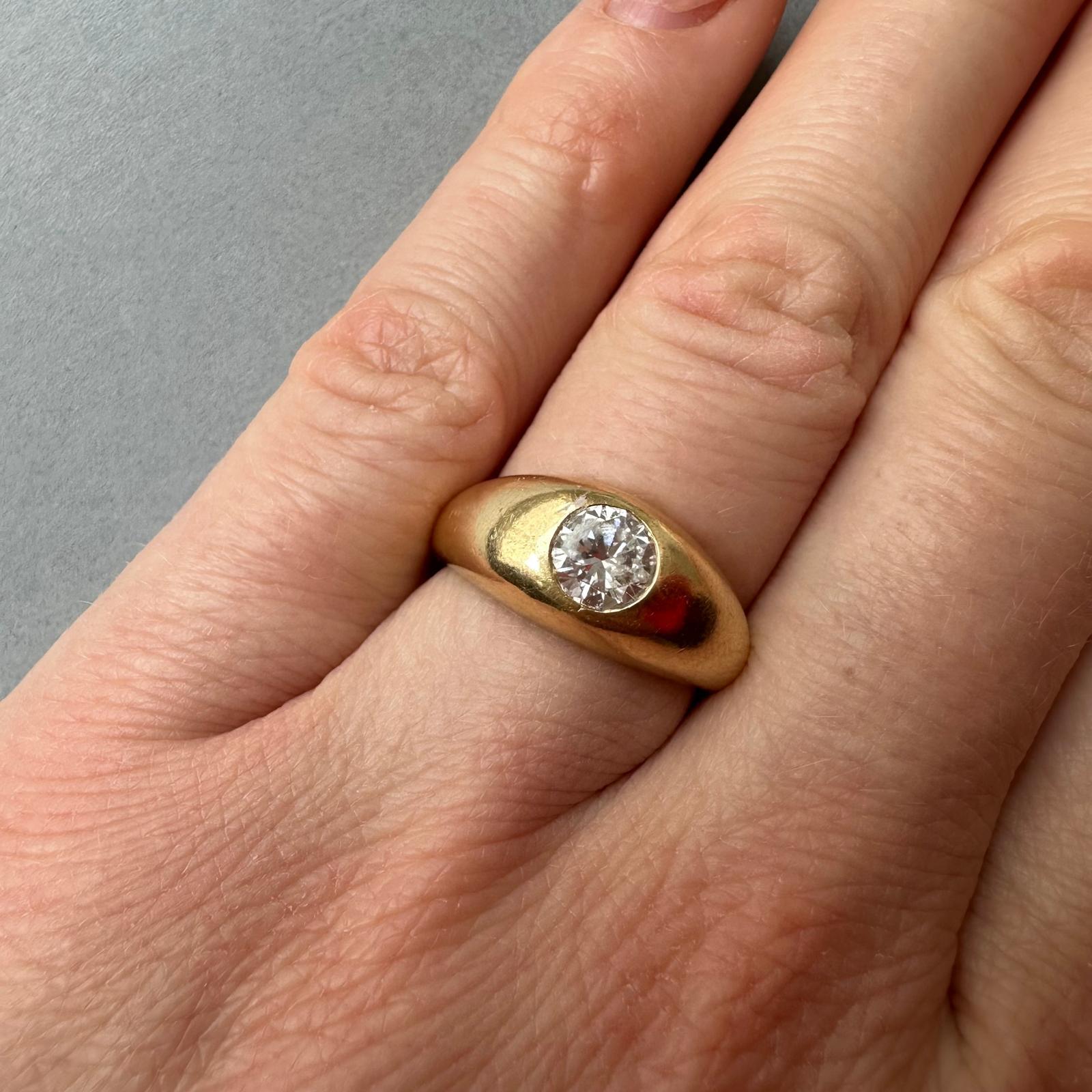 An 18k Gold Cartier Ring with a Flush set Solitair Diamond For Sale 2